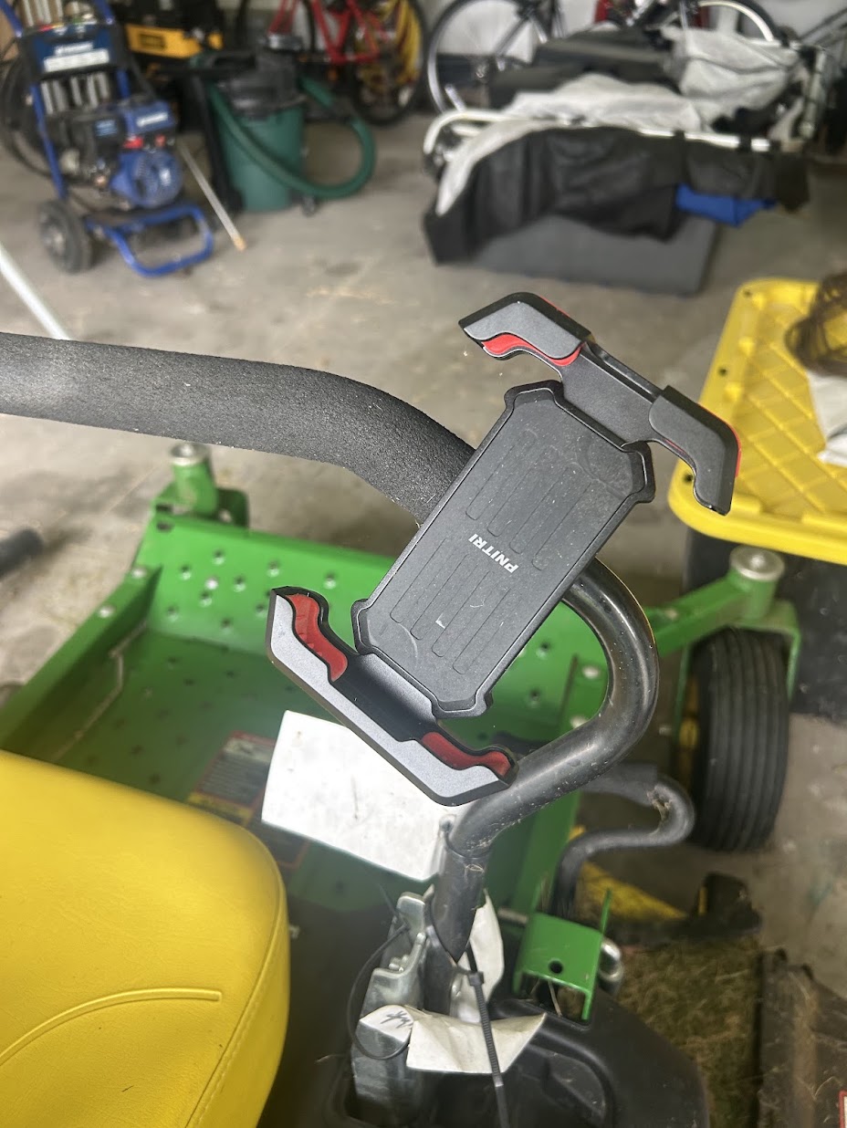 Phone mount on zero turn mower